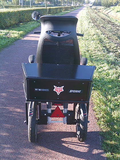 De achterkant van de Spidibike heeft een vaste 'bagagebak'. 